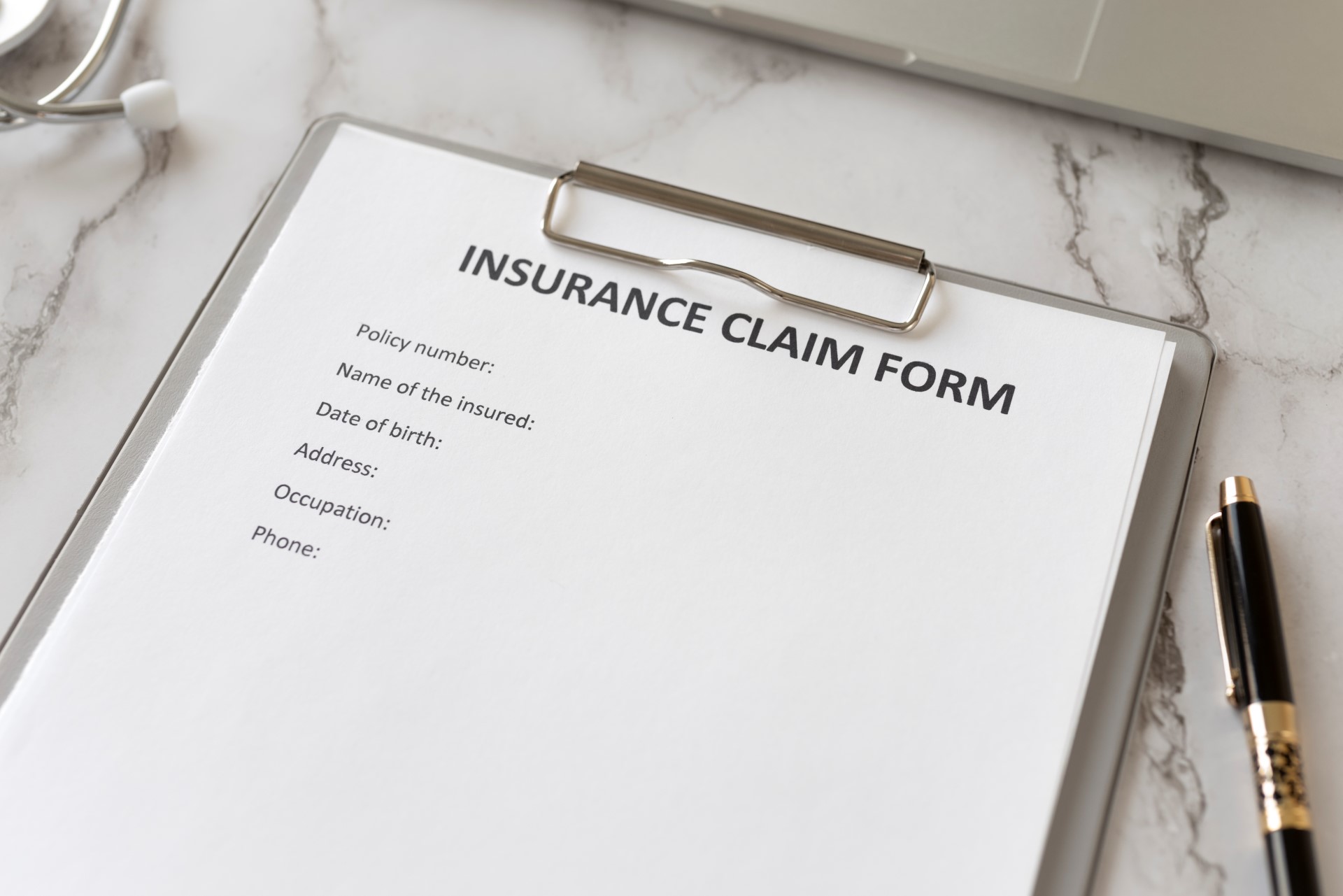 insurance-claim-form-high-angle-Car Insurance in Michigan-Car Insurance Claim Michigan